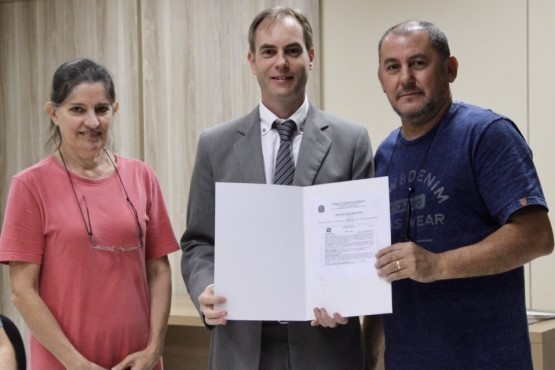 Entrega de título de propriedade.