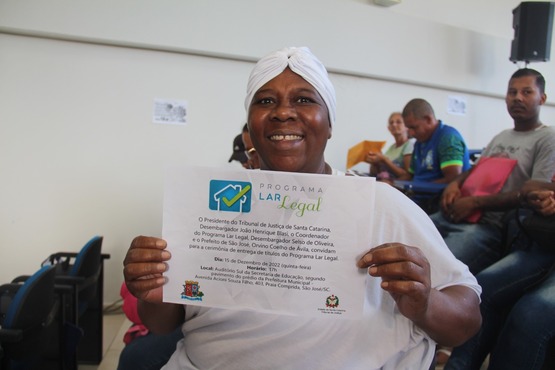 Entrega títulos de propriedade