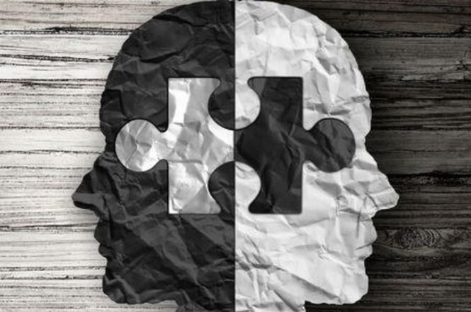 Foto ilustrativa: silhuetas de rostos humanos formadas por peças de quebra-cabeça, simbolizando saúde mental, transtornos psicológicos, neurodiversidade e compreensão do funcionamento da mente.